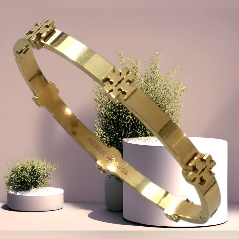 TORY BURCH GOLD RAISE DOUBLE T LOGO BRACELET
